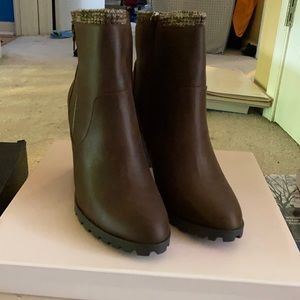 BRAND NEW high heeled booties. Perfect for fall!!